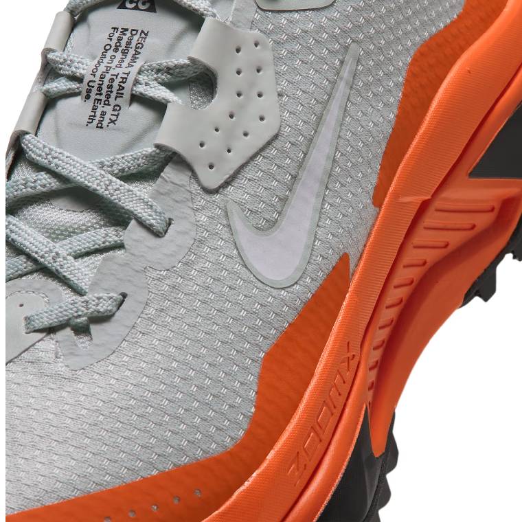 Мъжки маратонки ACG ZEGAMA TRAIL GTX в сиво и оранжево, изглед към горната част и междинната подметка