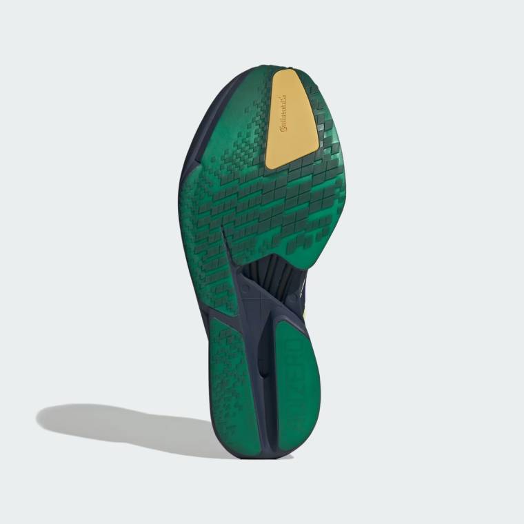 Маратонки Adidas Adizero Adios Pro 4 в тъмносиньо с жълто-розови ивици, близък план на подметката в зелено
