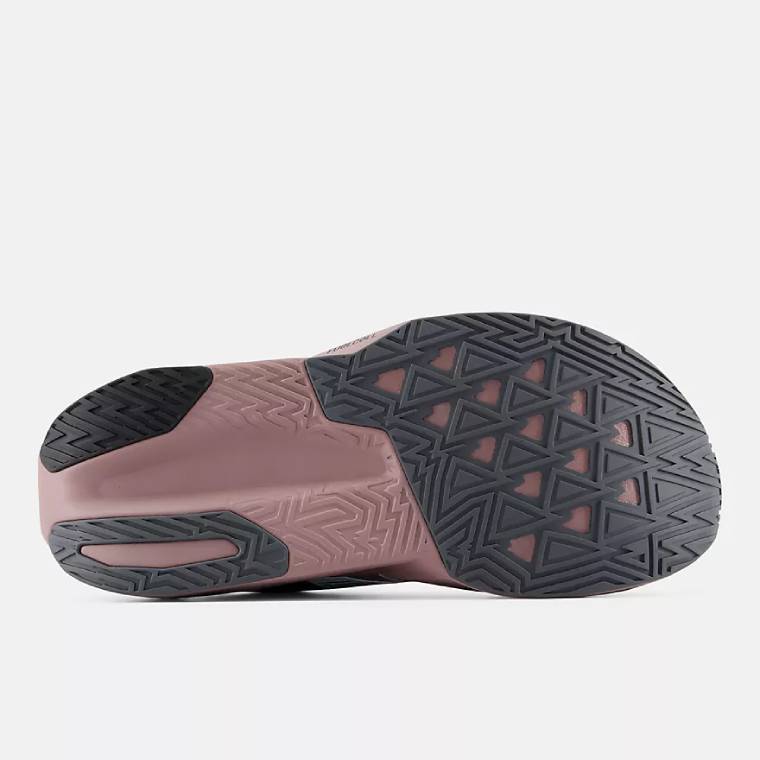 Гумена подметка в пепеляворозово и тъмносиво на маратонки New Balance FuelCell Rebel. 