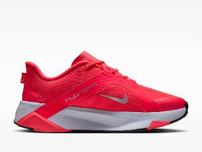 Ярко червена спортна обувка Nike Hybrid RN с бяла и червена подметка, страничен изглед. 